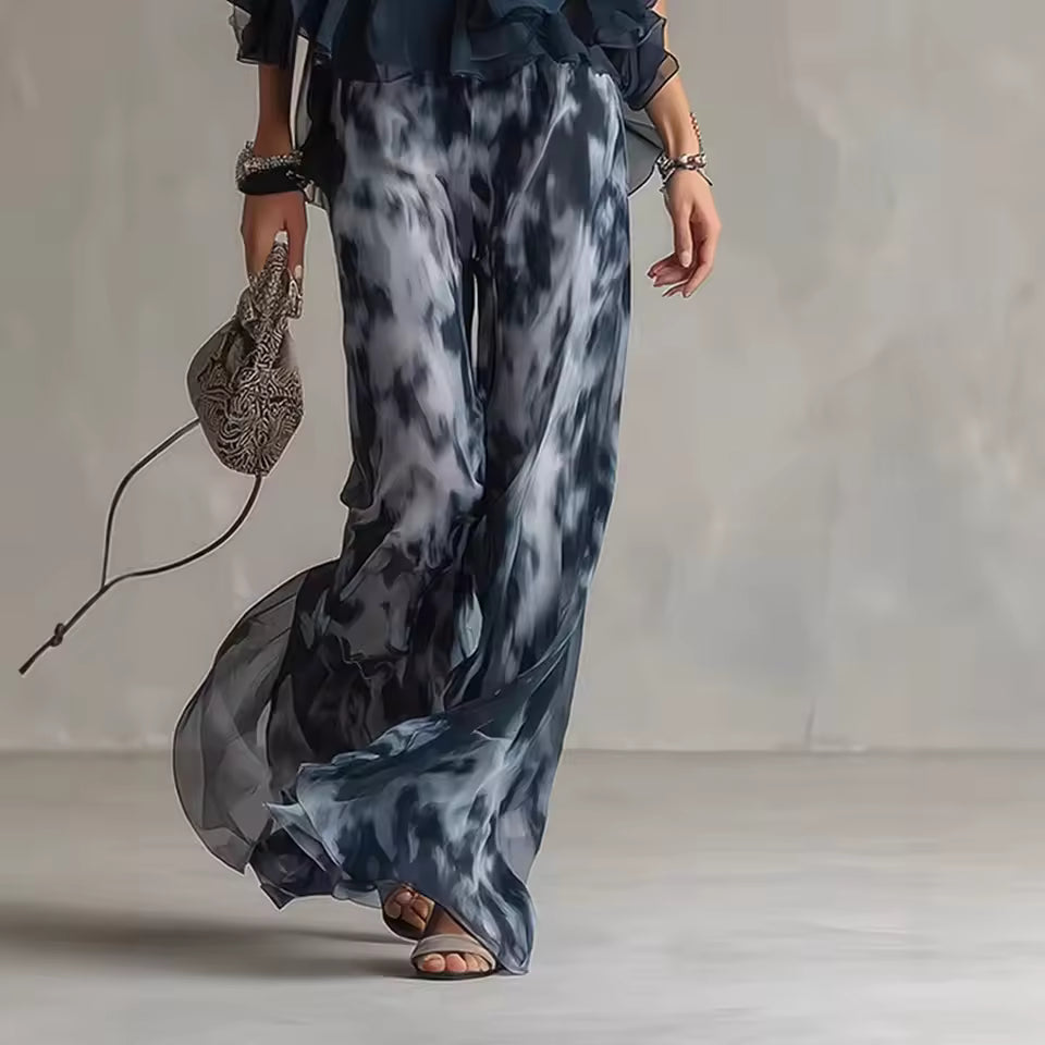 elegant blue and white printed wide leg pants for women with flowy chiffon effect fabric sophisticated feminine style ideal for vacations events and stylish occasions