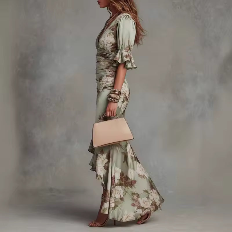 elegant green asymmetric floral maxi dress for women side view with flowy ruffles and irregular hem sophisticated feminine fashion perfect for events