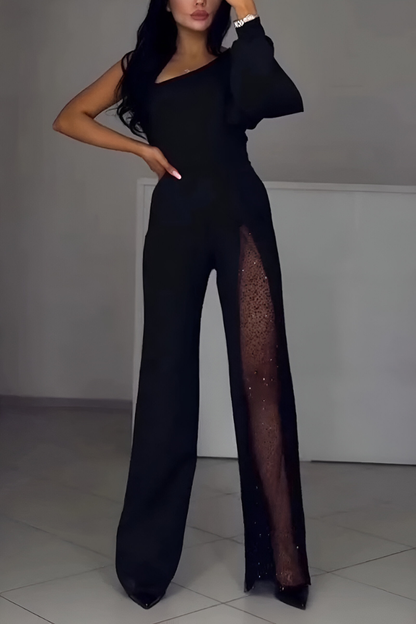 NOELIA | Asymmetrical jumpsuit with glitter detail