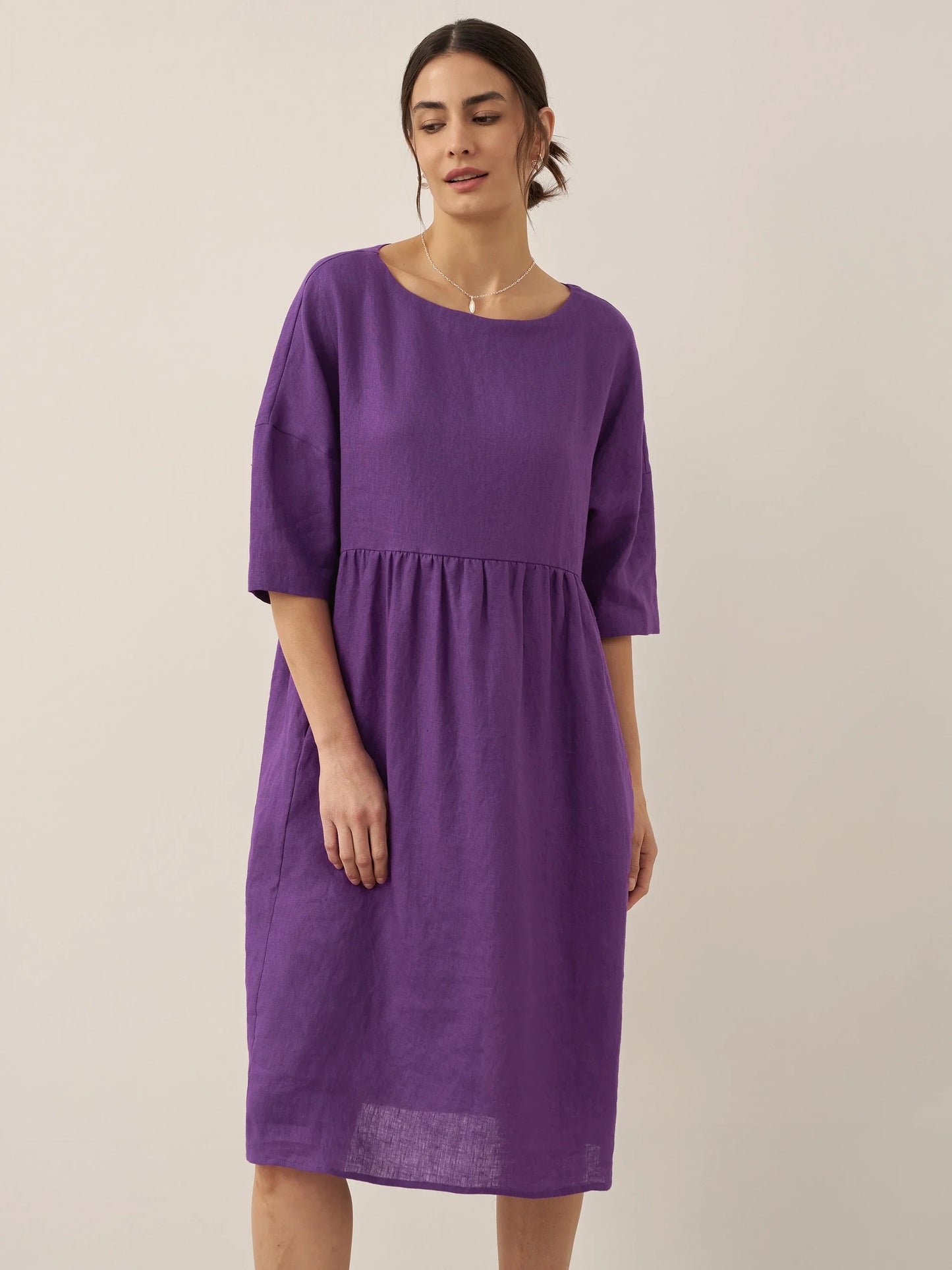 LINEN MIDI DRESS WITH THREE-QUARTER SLEEVE CUT