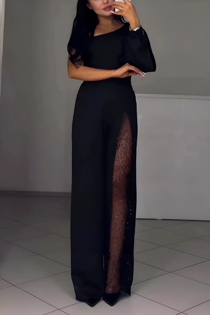 NOELIA | Asymmetrical jumpsuit with glitter detail