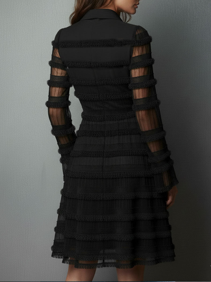 VESTIDO MINI NEGRO CON FLECOS TEXTURIZADOS Y CAPAS TRANSPARENTES. MODERNO Y PERFECTO PARA FIESTAS O EVENTOS. CONSÍGUELO HOY