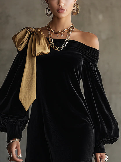 elegant black velvet mini dress for women with asymmetric off shoulder and gold bow refined feminine fashion perfect for events dinners and special occasions