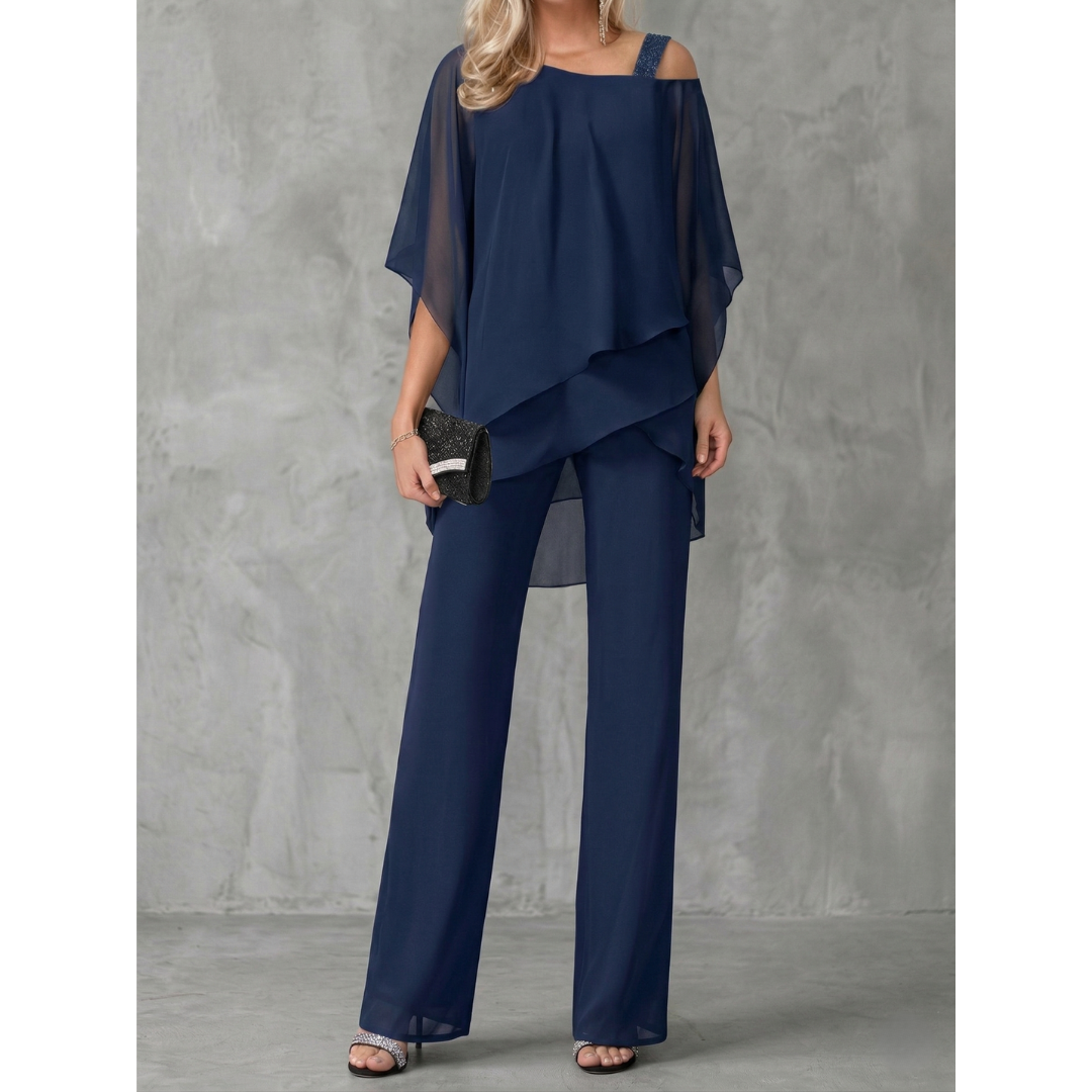 elegant blue asymmetric off shoulder two piece set for women sophisticated feminine fashion perfect for events dinners and stylish occasions