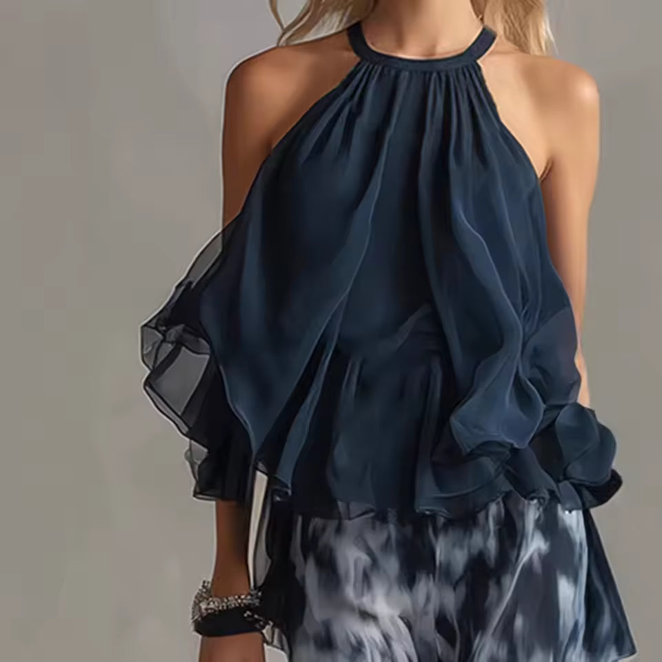 elegant blue sleeveless halter top for women refined feminine fashion lightweight chiffon effect design perfect for vacations dinners and smart casual outfits