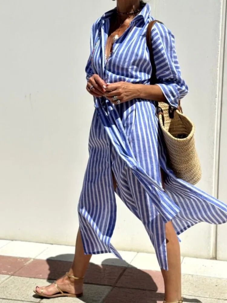 elegant blue vertically striped shirt midi dress for women with three quarter sleeves button front and relaxed fit ideal for vacations beach walks outdoor leisure and effortless summer style