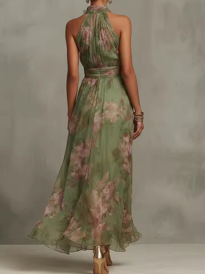 back view of floral halter maxi dress with flowing silhouette and elegant drape sophisticated occasion wear for celebrations destination weddings and outdoor events
