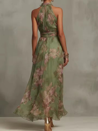 back view of floral halter maxi dress with flowing silhouette and elegant drape sophisticated occasion wear for celebrations destination weddings and outdoor events