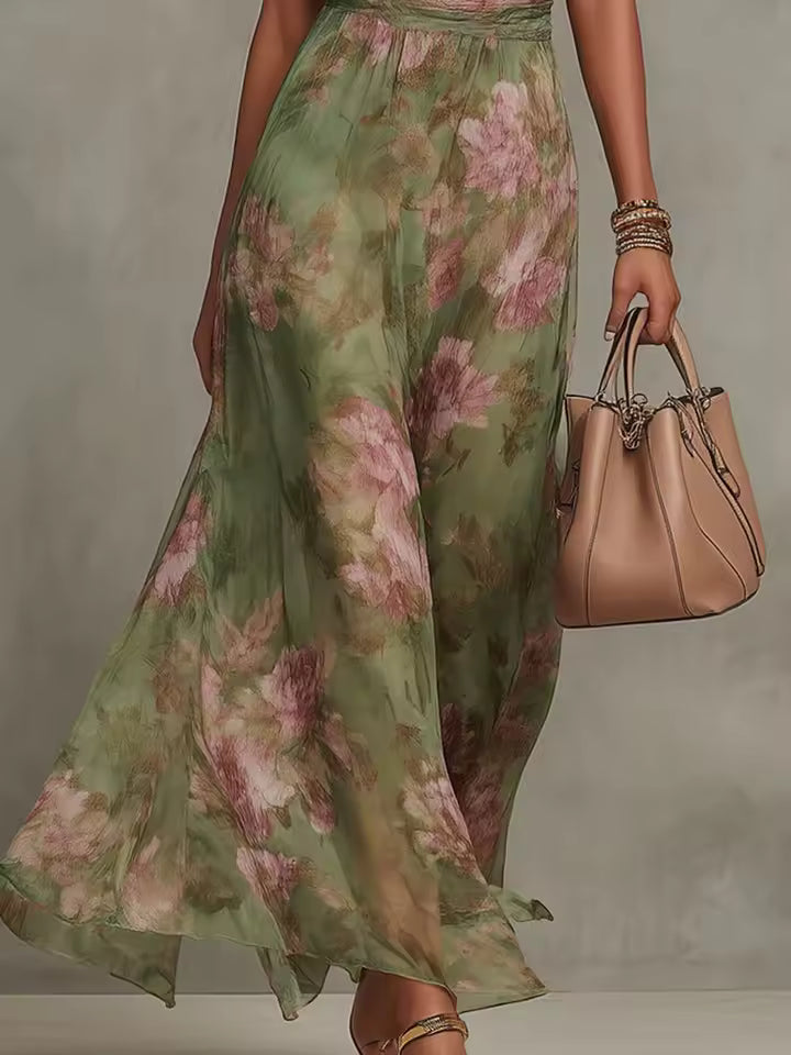 close up of floral maxi dress skirt with lightweight flowing fabric and elegant movement romantic feminine style for celebrations and outdoor events