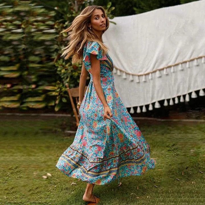 side view of elegant flowy maxi dress showcasing lightweight fabric fluid movement and refined summer style perfect for vacations outdoor celebrations and resort wear