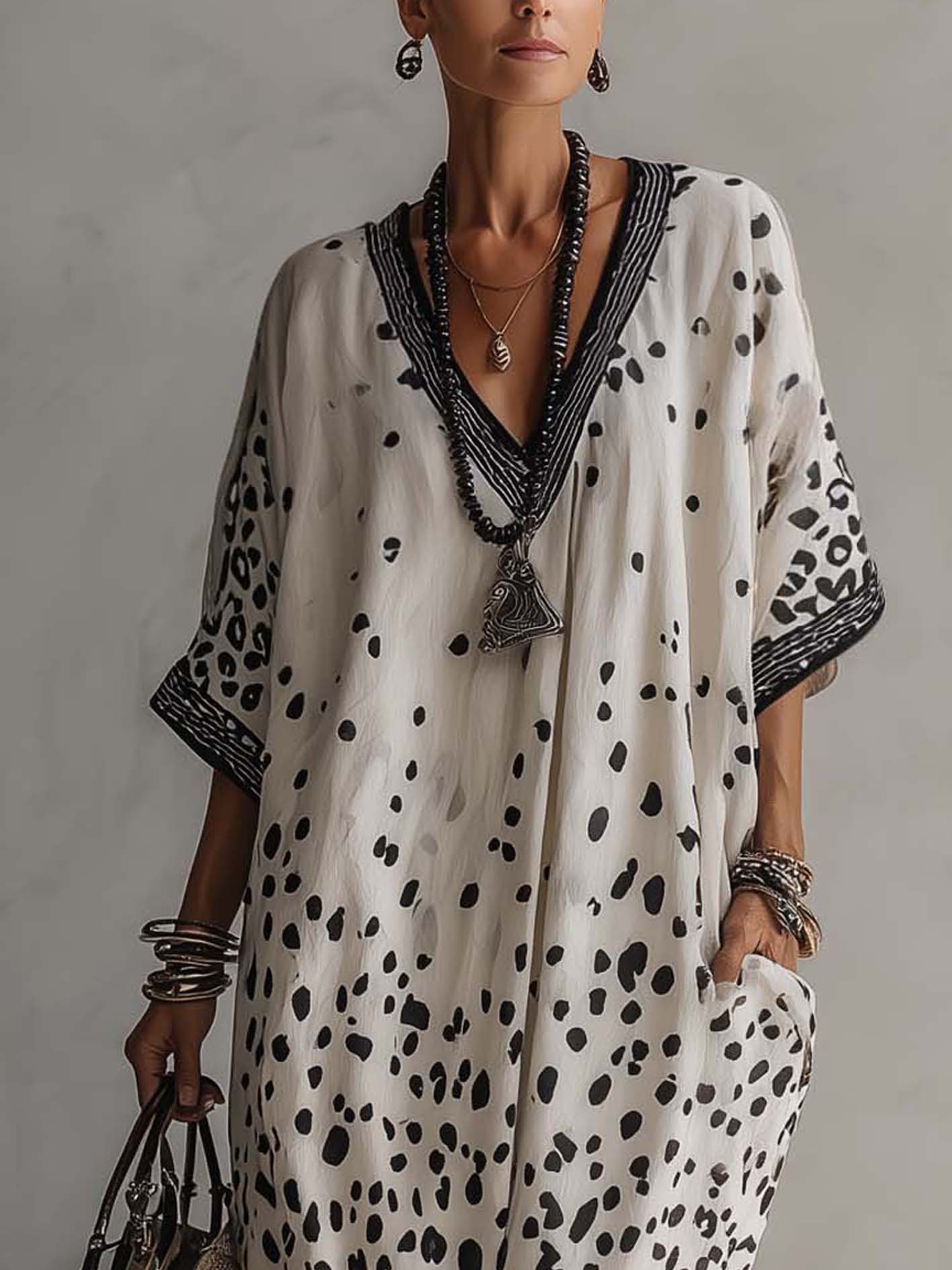 close up of gray ombre leopard chiffon maxi dress featuring elegant neckline soft drape and refined print ideal for vacation wardrobes and stylish summer looks