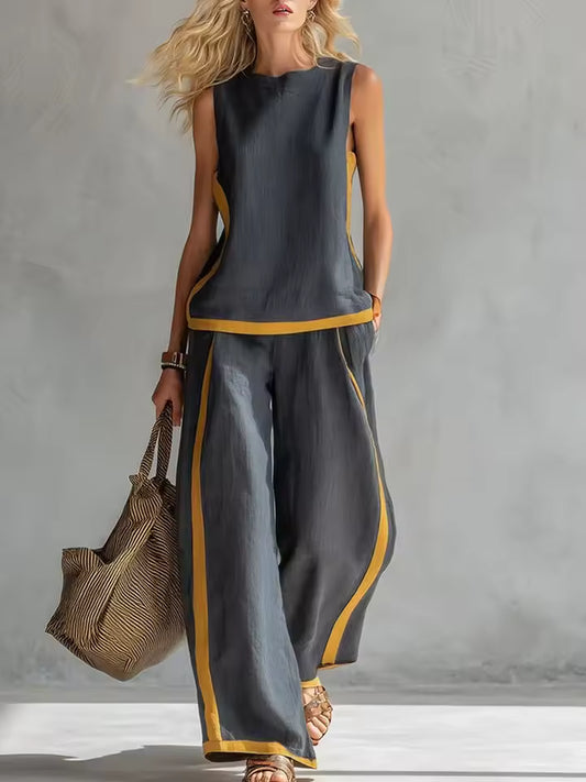 elegant gray two piece set for women with sleeveless blouse and wide leg pants refined versatile comfortable feminine fashion perfect for office outfits and occasions
