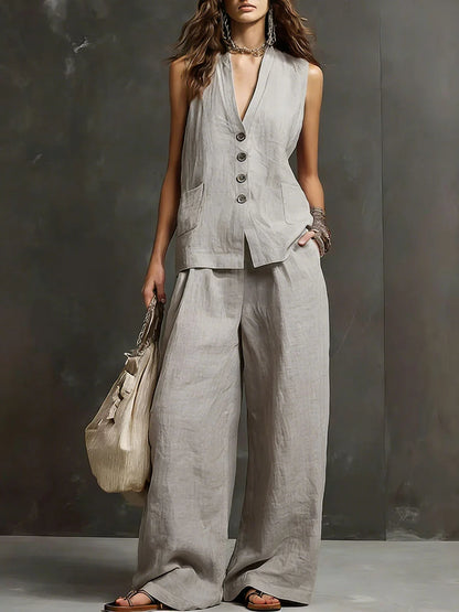 elegant gray two piece set for women with v neck button top and wide leg pants sophisticated feminine fashion perfect for office outfits and occasions