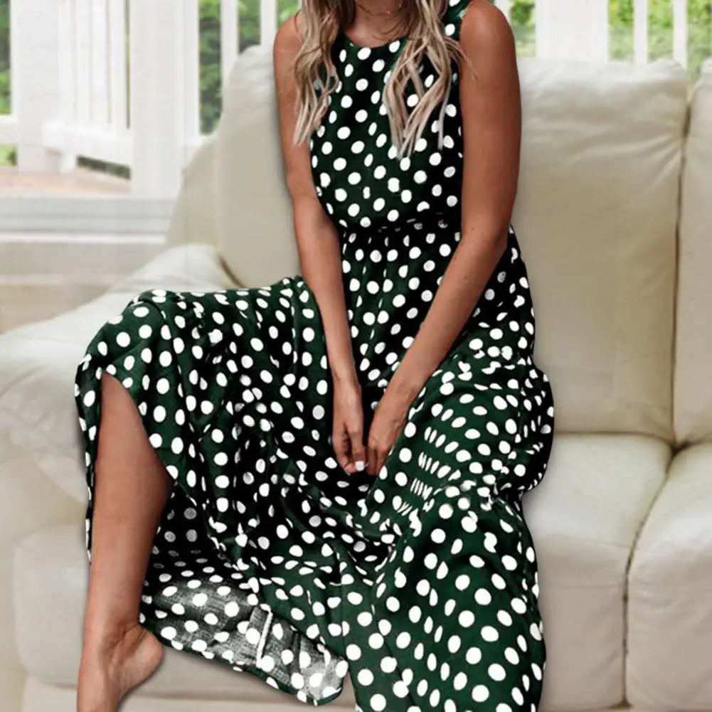 elegant green polka dot sleeveless maxi dress for women with flowy silhouette sophisticated feminine fashion perfect for events and stylish occasions