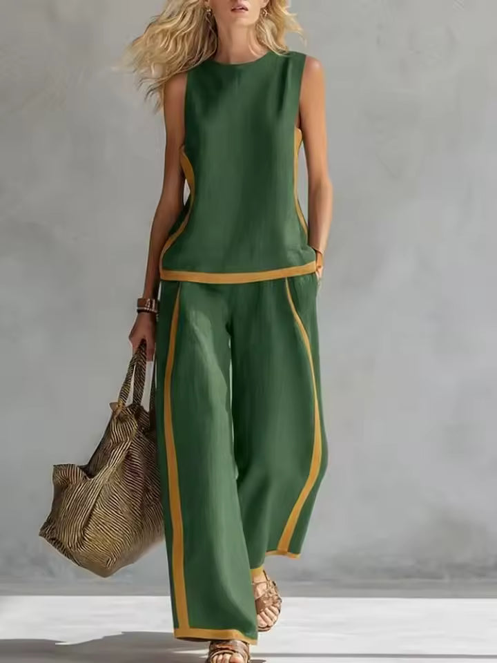 elegant green two piece set for women with sleeveless blouse and wide leg pants sophisticated versatile comfortable feminine fashion ideal for stylish occasions
