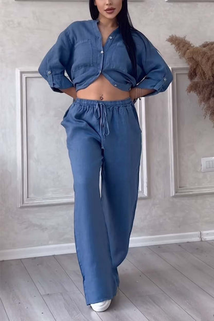 CONJUNTO BLUSA BOTONES Y PANTALÓN RECTO