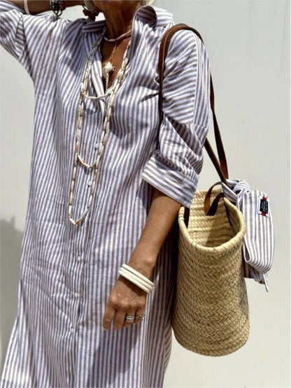 close up front view of khaki striped shirt midi dress highlighting the shirt collar buttons and comfortable relaxed silhouette perfect for travel and casual elegance