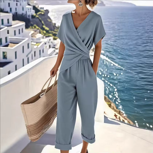 elegant light blue asymmetric two piece set for women with short sleeves refined feminine fashion perfect for events dinners and stylish occasions