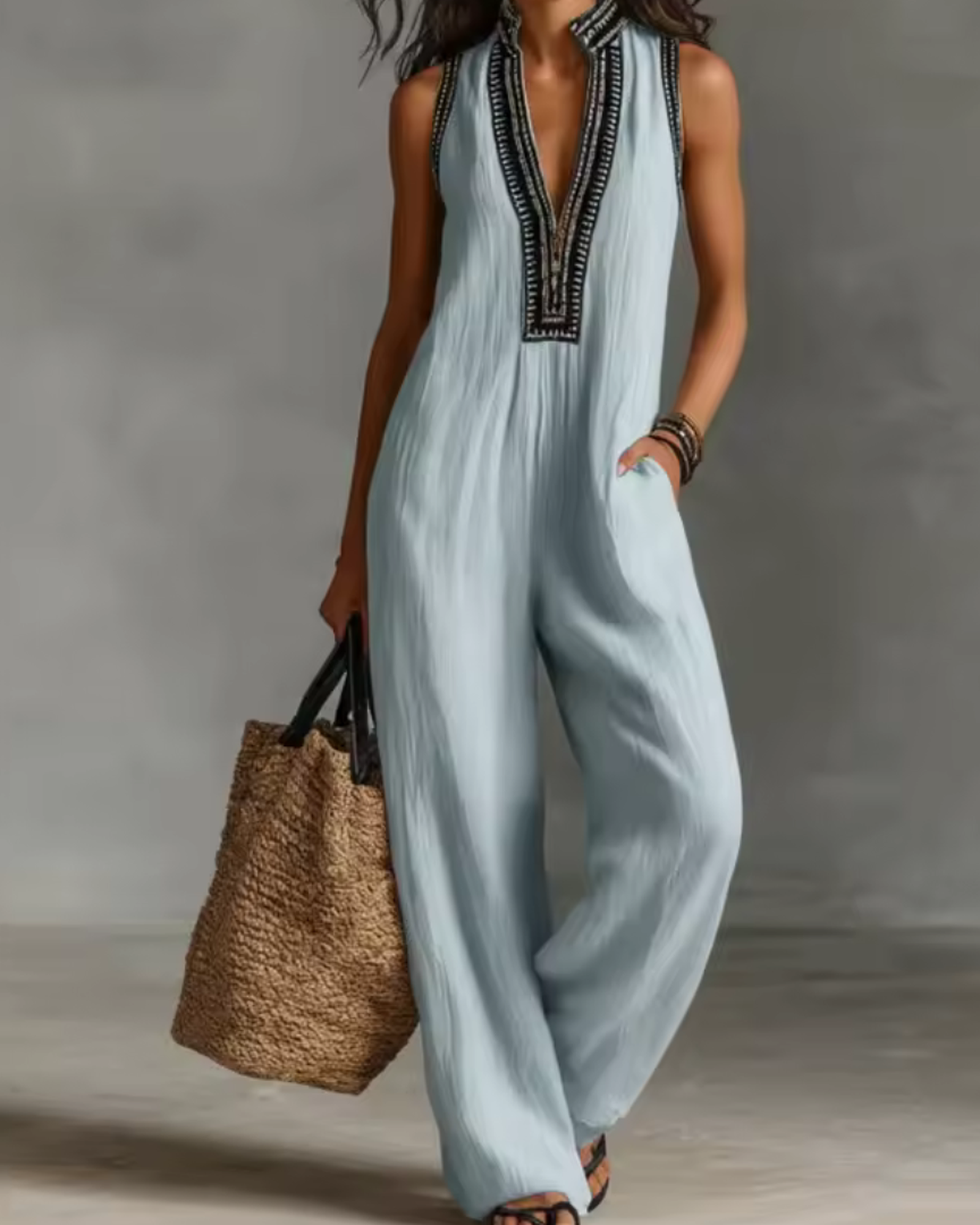 elegant light blue jumpsuit for women with high neck zipper and embroidery refined feminine fashion perfect for events and stylish occasions
