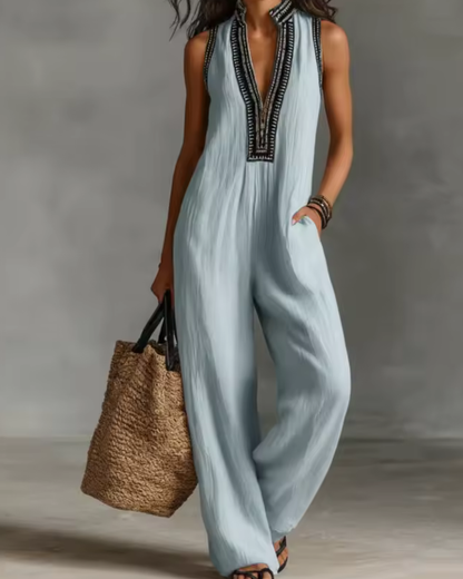 elegant light blue jumpsuit for women with high neck zipper and embroidery refined feminine fashion perfect for events and stylish occasions