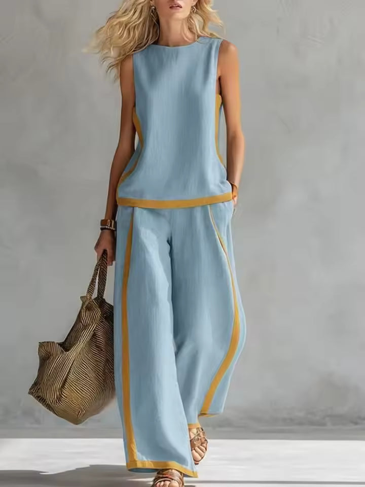 elegant light blue two piece set for women with sleeveless blouse and wide leg pants refined modern comfortable feminine fashion perfect for stylish occasions