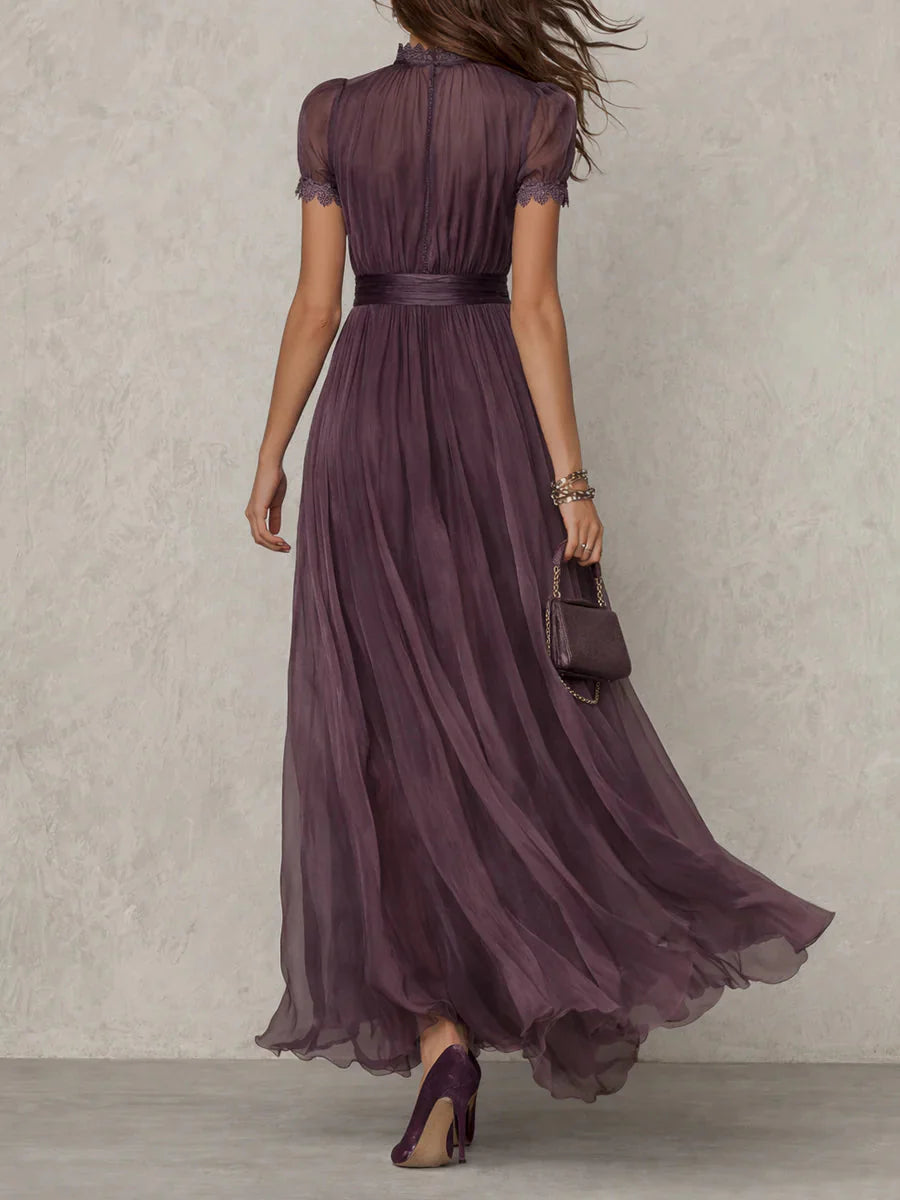 back view of elegant purple maxi dress with lace details and flowing silhouette refined feminine style perfect for weddings ceremonies and evening events