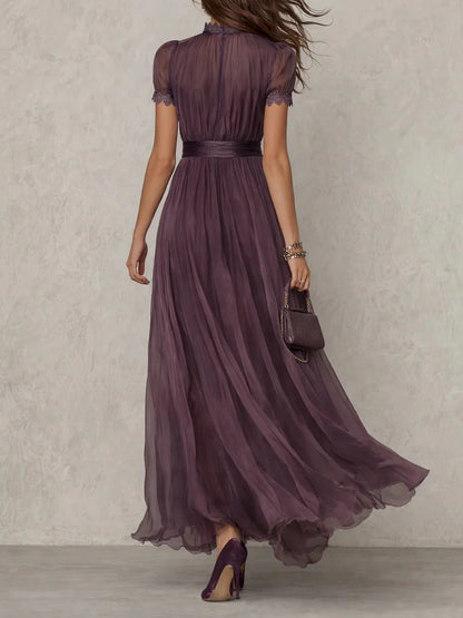 back view of elegant purple maxi dress with lace details and flowing silhouette refined feminine style perfect for weddings ceremonies and evening events