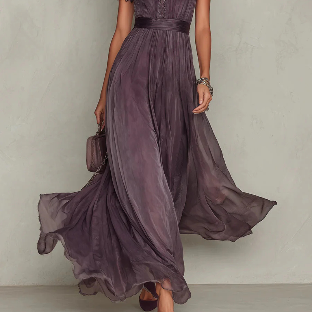 close up of flowing purple maxi dress skirt with lace details elegant movement and sophisticated silhouette ideal for formal events and special occasions