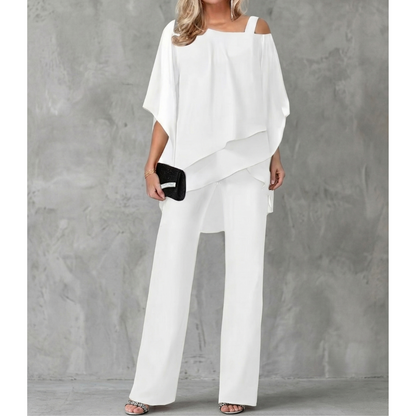 elegant white asymmetric off shoulder two piece set for women sophisticated feminine fashion perfect for events dinners and stylish occasions
