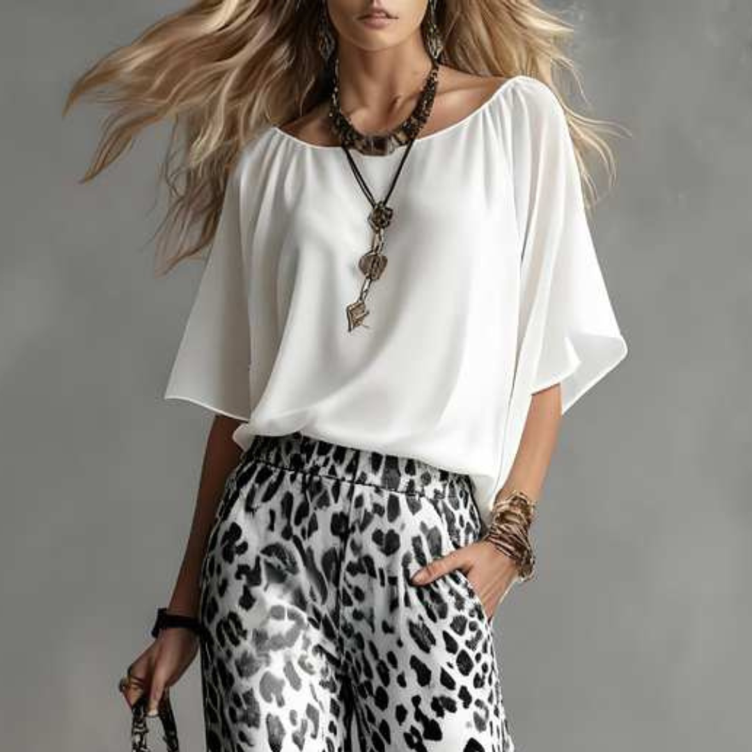 close up of elegant white blouse featuring refined tailoring and versatile styling ideal for smart casual outfits vacations and contemporary feminine wardrobes