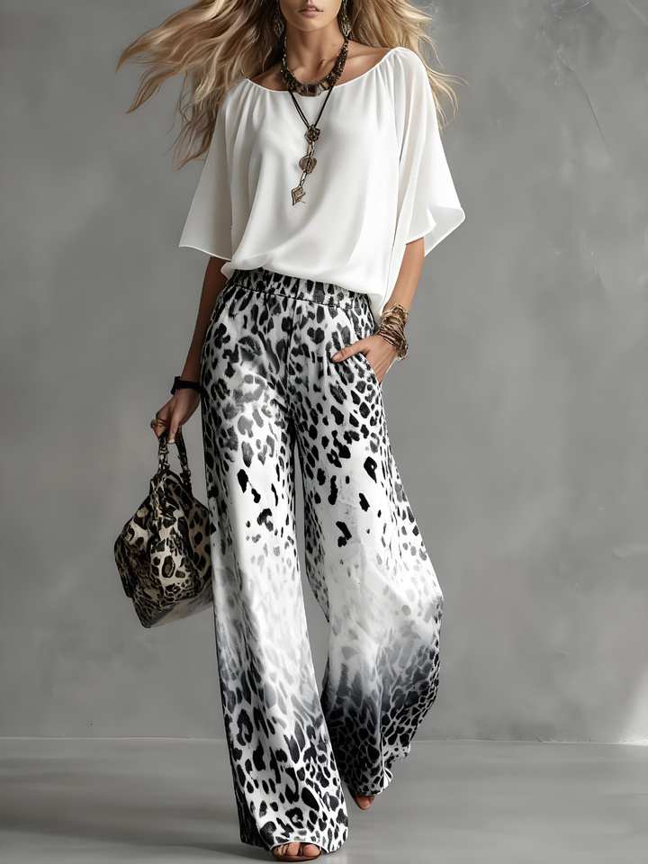 elegant white blouse and gray ombre leopard pants set for women sophisticated contemporary outfit ideal for vacations stylish dinners resort wear and elevated everyday fashion