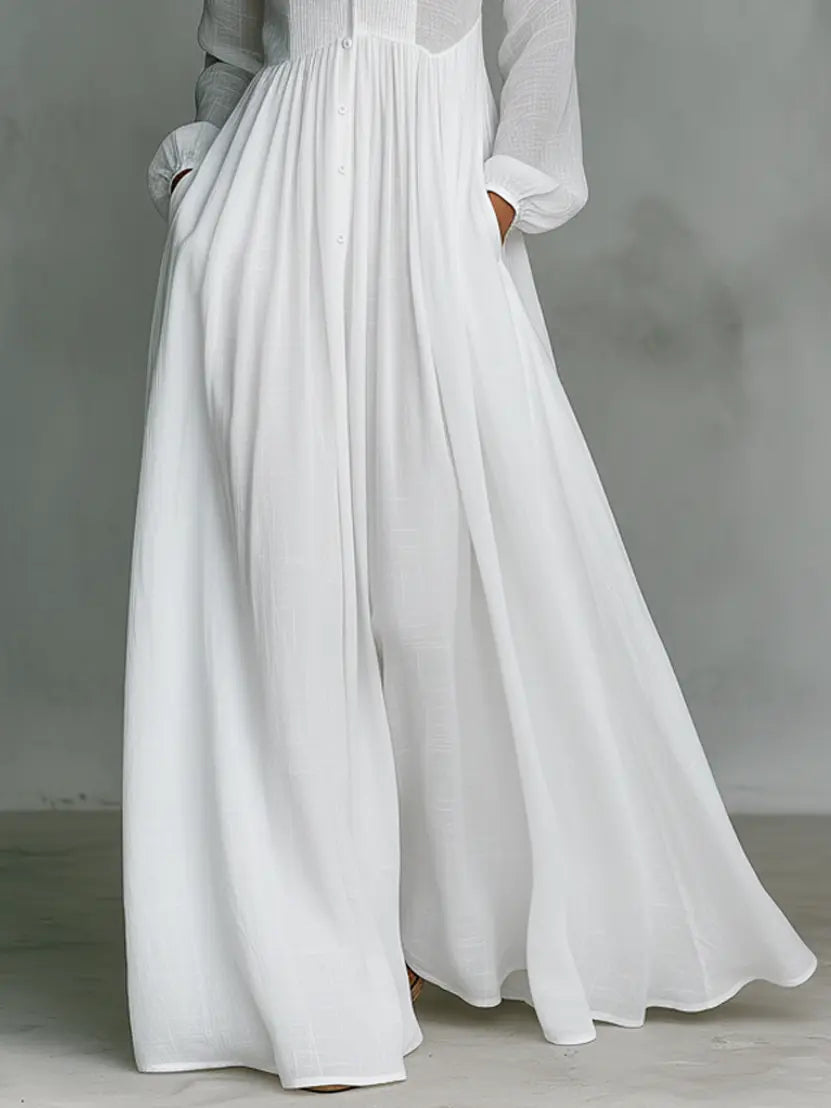 close up of white cotton linen maxi dress with flowy skirt and relaxed silhouette elegant minimalist fashion for women inspired by quiet luxury style