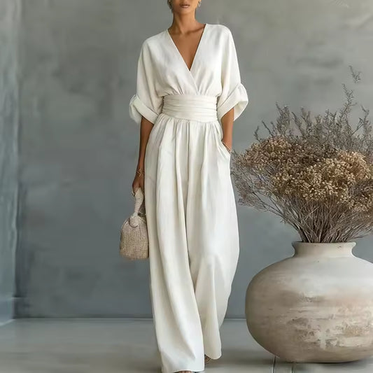 elegant white long jumpsuit for women with deep v neck and three quarter sleeves refined feminine fashion perfect for events and stylish occasions