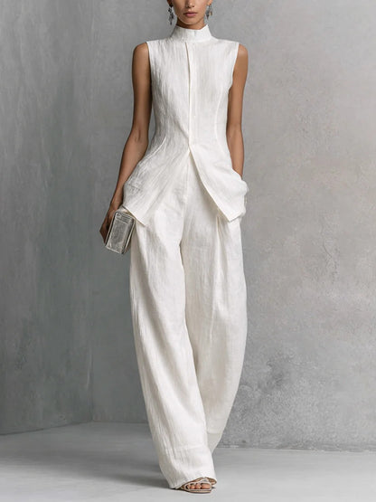 elegant white two piece set for women with high neck top and wide leg pants sophisticated feminine fashion perfect for events and stylish occasions