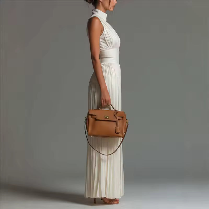 elegant white sleeveless jumpsuit for women side view with pleated wide leg sophisticated feminine fashion perfect for events and occasions