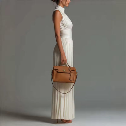 elegant white sleeveless jumpsuit for women side view with pleated wide leg sophisticated feminine fashion perfect for events and occasions