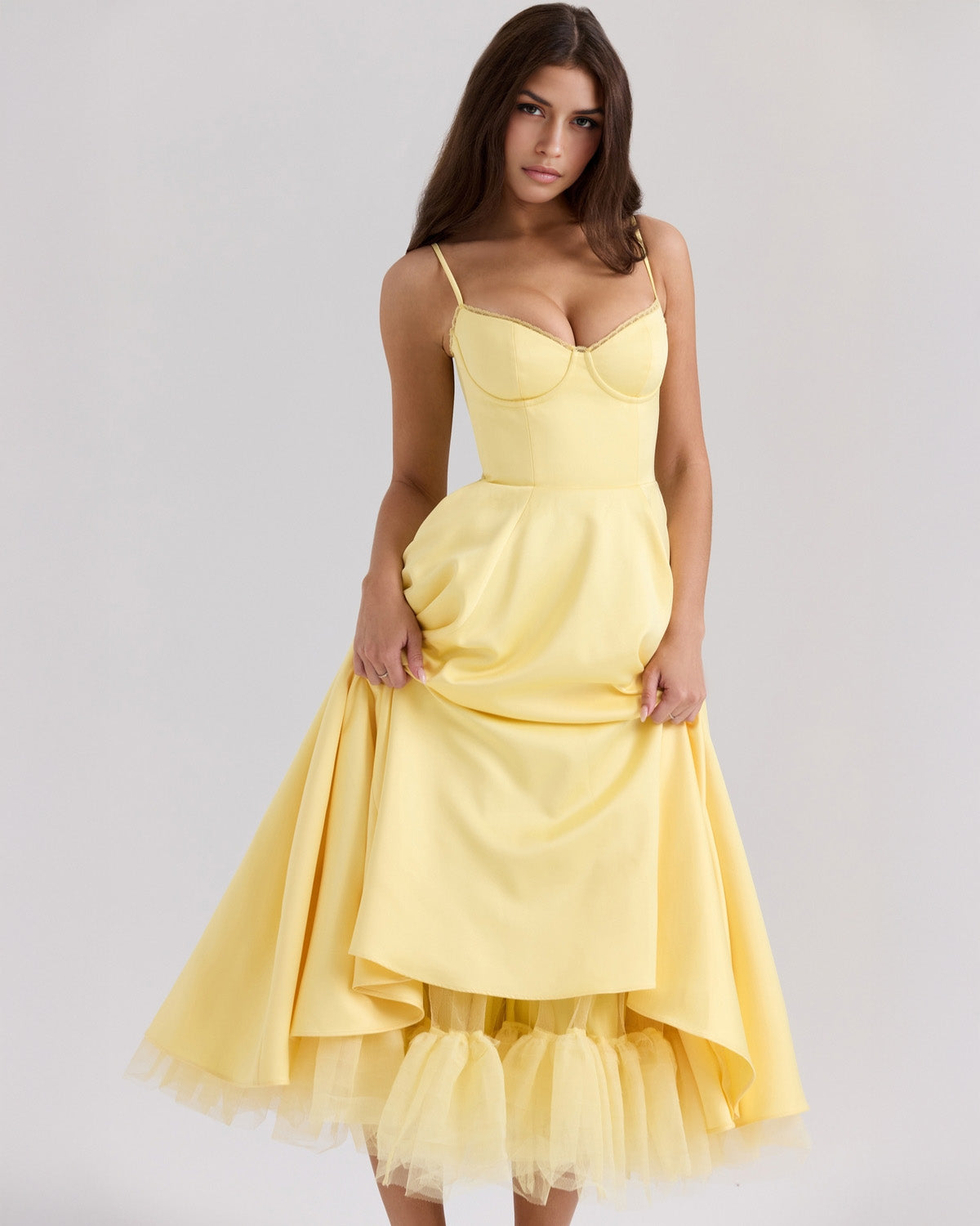 elegant yellow duchess satin midi dress with flowing tulle skirt showcased in motion highlighting graceful volume perfect for weddings romantic celebrations and special occasions
